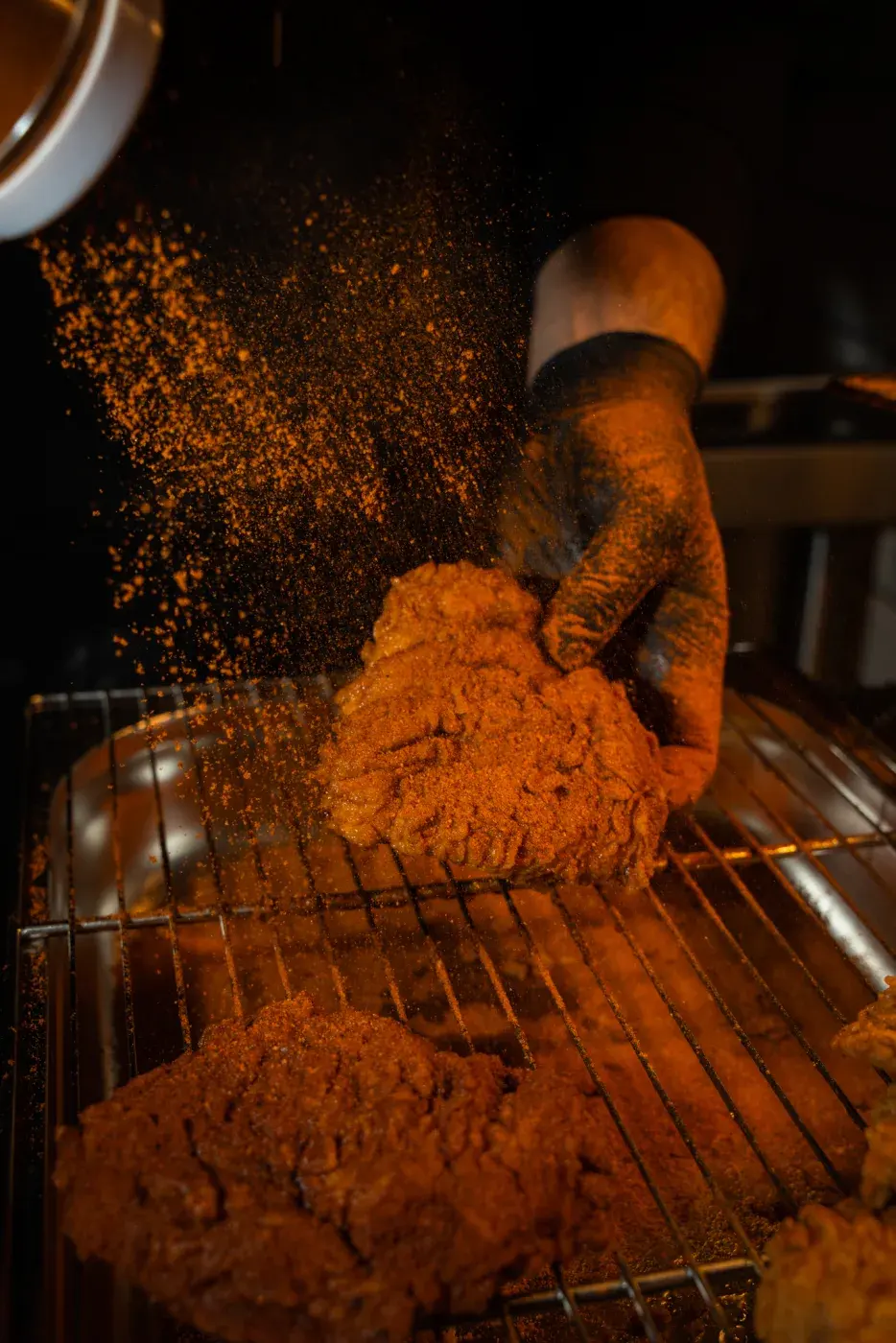Red spice cloud applied to fried chicken